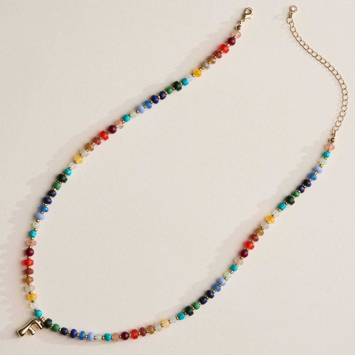 Frem - Vibrant Beaded Necklaces with Gold Initial Charms – Set of 16 Unique Designs